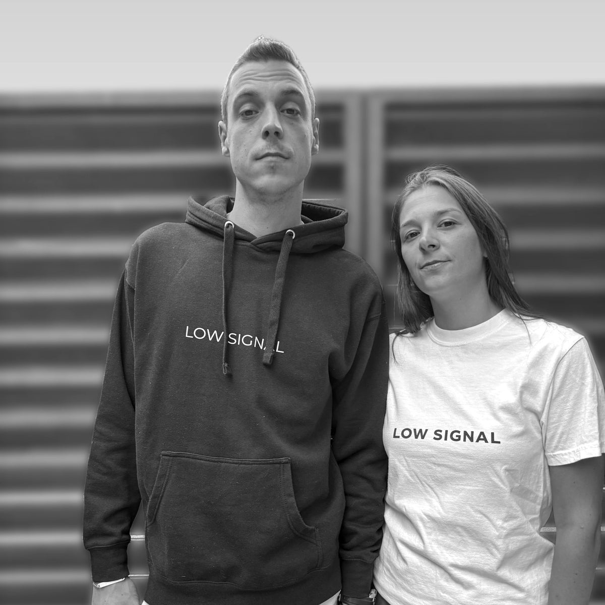 LOW SIGNAL CORE Hoodie in Carbon Black and CORE Tee in Matte White, worn, black and white
