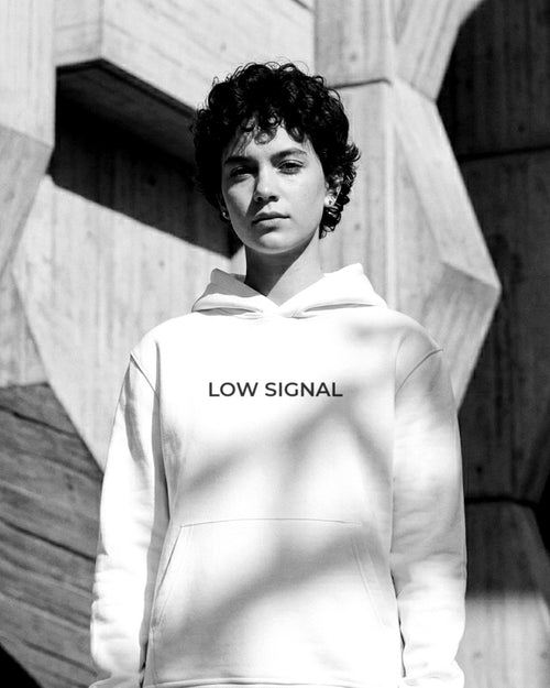 LOW SIGNAL CORE Hoodie in Matte White, worn — black and white