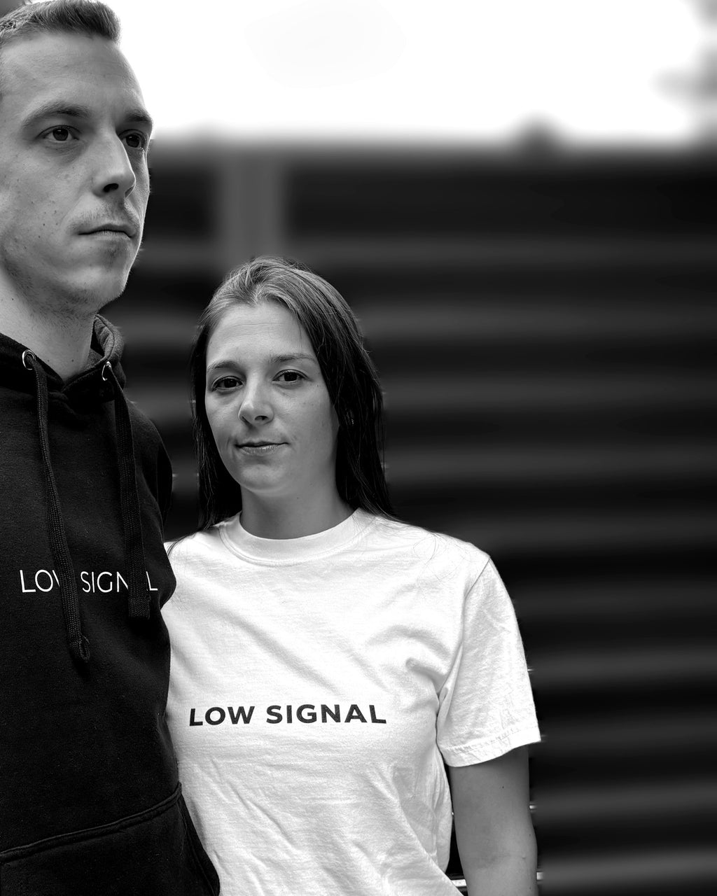 LOW SIGNAL CORE Tee in Matte White, worn — black and white